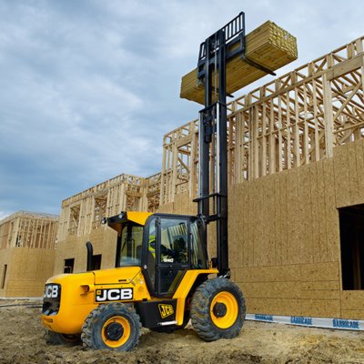 Forklift unloading machinery and industrial equipment in Harpenden